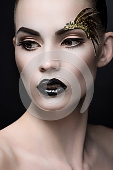 Close up portrait of woman with expressive makeup