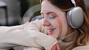 Close Up Portrait Of A Woman Listening Music At Home