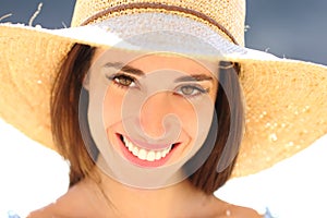 Close up portrait of a woman smiling on the beach