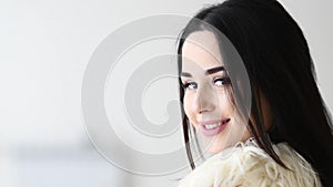 Close up portrait of woman turn around with windy hair long eyelashes