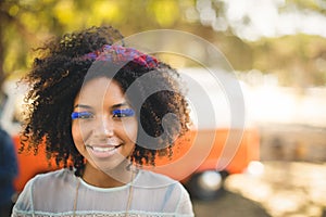 Close up portrait of woman wearing artificial eyelashes