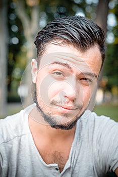 Close up portrait of youg stylish man photo