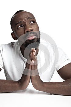 Close up portrait of a young african man indoors