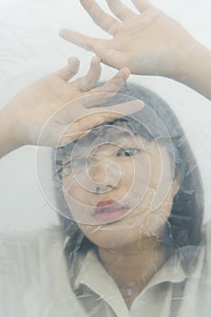 Close up portrait of young asian thai black short hair woman covered with white cloth fabric silk