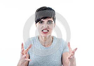 Human expressions and emotions. Desperate young attractive woman with angry face looking furious