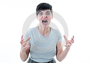 Human expressions and emotions. Desperate young attractive woman with angry face looking furious