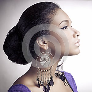 Close-up portrait of young beautiful african woman