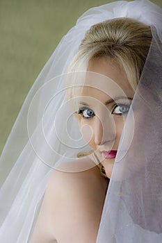 Close up portrait of young beautiful blonde bride