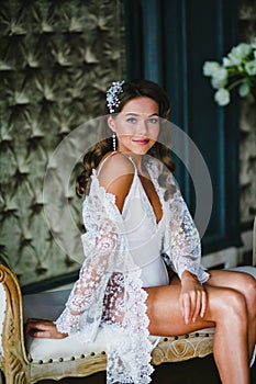 Close-up portrait of young beautiful bride preparing to wedding ceremony