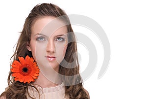 Close up portrait of young beautiful woman with fl