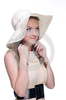 Close up portrait of young beautiful woman in hat