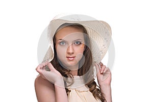 Close up portrait of young beautiful woman in hat