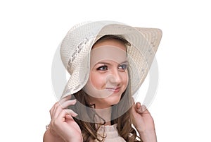 Close up portrait of young beautiful woman in hat