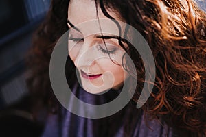 close up portrait of young beautiful woman smiling outdoors. Happiness and lifestyle