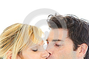 Close up portrait of young couple kissing