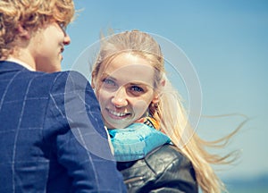 Close up portrait young couple at the seaside