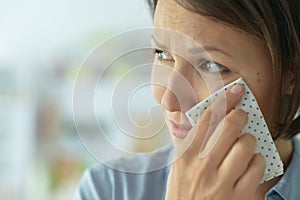 Close up portrait of young crying woman