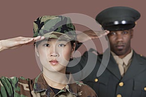 Close-up portrait of young female soldier with mal