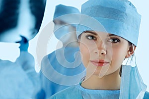Close up portrait of young female surgeon doctor