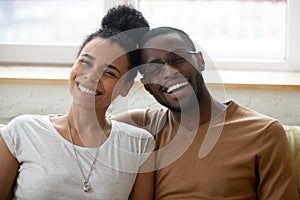 Close up portrait of young happy african american couple.