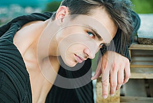 Close up portrait of young man. Sexy handsome male model. Beautiful eyes.