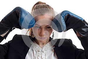 A close-up portrait young sexual girl with boxing gloves on your hands