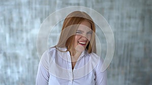 Close up portrait of a young woman. body language and gestures. she is disgusted. Slow motion.