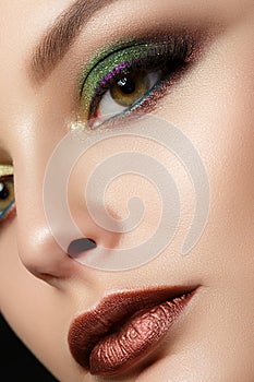 Close up portrait of young woman with fashion makeup