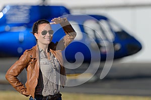 Close up portrait young woman helicopter pilot