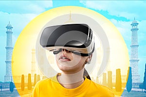 Close-up portrait of a young woman wearing virtual reality glasses. Blue background with a yellow circle and blurred historic