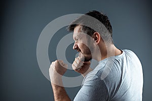 Close-up, portraits of a man preparing for a fight. Self-digging, conscience, argument, confrontation, war photo