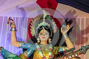Close up portrat statue of saraswati maa, Goddess of music photo