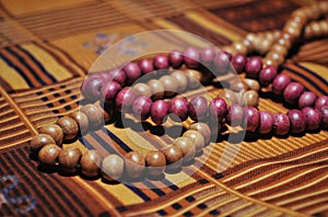 Close up prayer beads isolated on prayer rug