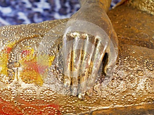 Close up praying hands of Buddha. Praying hands golden of Buddha.