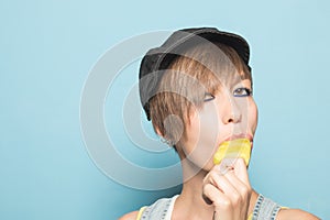 Close-up of a pretty girl eating ice cream