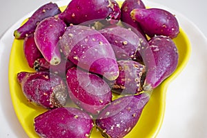 Close up prickly pears on plate