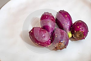 Close up prickly pears on plate