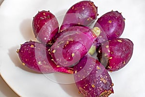 Close up prickly pears on plate