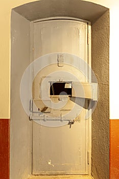 Close up of a prison cell door in a very old prison