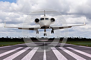 Close up of a private jet landing