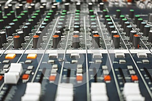 Close-up of professional concert mixing console, equipment for sound mixer control
