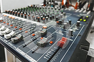 Close-up of professional concert mixing console, equipment for sound mixer control