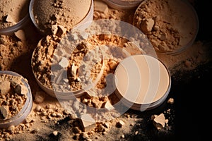 Close-up of a professional cosmetic product - beige face powder with different shades