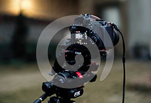 Professional Video Camera Rig Setup on Tripod for Filming Production