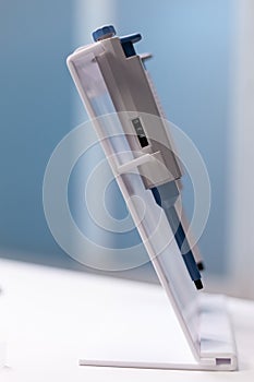 Close up of professional micro pipette on lab desk