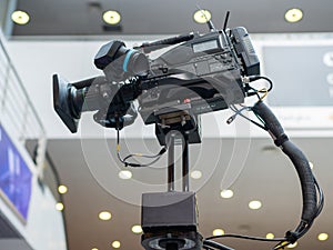Close-up of a professional television camera.