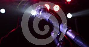 Close up of a professional vocal wire microphone on a microphone stand
