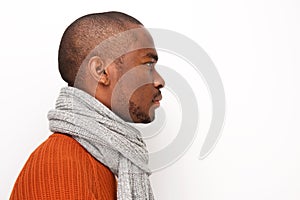Close up profile of african american man with scarf against isolated white background