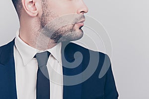 Close up profile half face portrait of bearded young director i