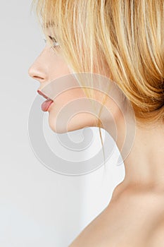 Close-up profile of redhead woman